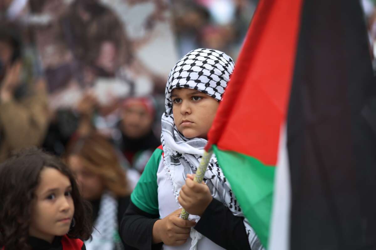 Demonstrators rally and march through downtown to show support for the Palestinian people on October 11, 2023 in Chicago, Illinois.