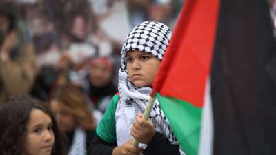 Demonstrators rally and march through downtown to show support for the Palestinian people on October 11, 2023 in Chicago, Illinois.