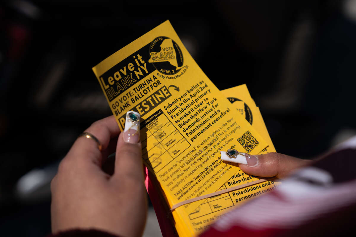 Simrand Thind holds a Leave it Blank flyer outside of Masjid Al-Abidin on March 29, 2024, in the Queens Borough of New York City.