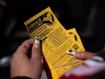 Simrand Thind holds a Leave it Blank flyer outside of Masjid Al-Abidin on March 29, 2024, in the Queens Borough of New York City.