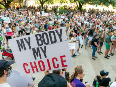 A sign reading 'my body my choice' is seen as abortion rights activists protest at the Federal Courthouse Plaza, after the overturning of Roe v. Wade by the Supreme Court, in Austin, Texas, on June 24, 2022.