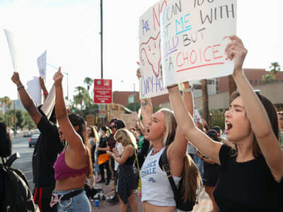 Abortion rights protesters chant during a Pro Choice rally at the Tucson Federal Courthouse in Tucson, Arizona on July 4, 2022.