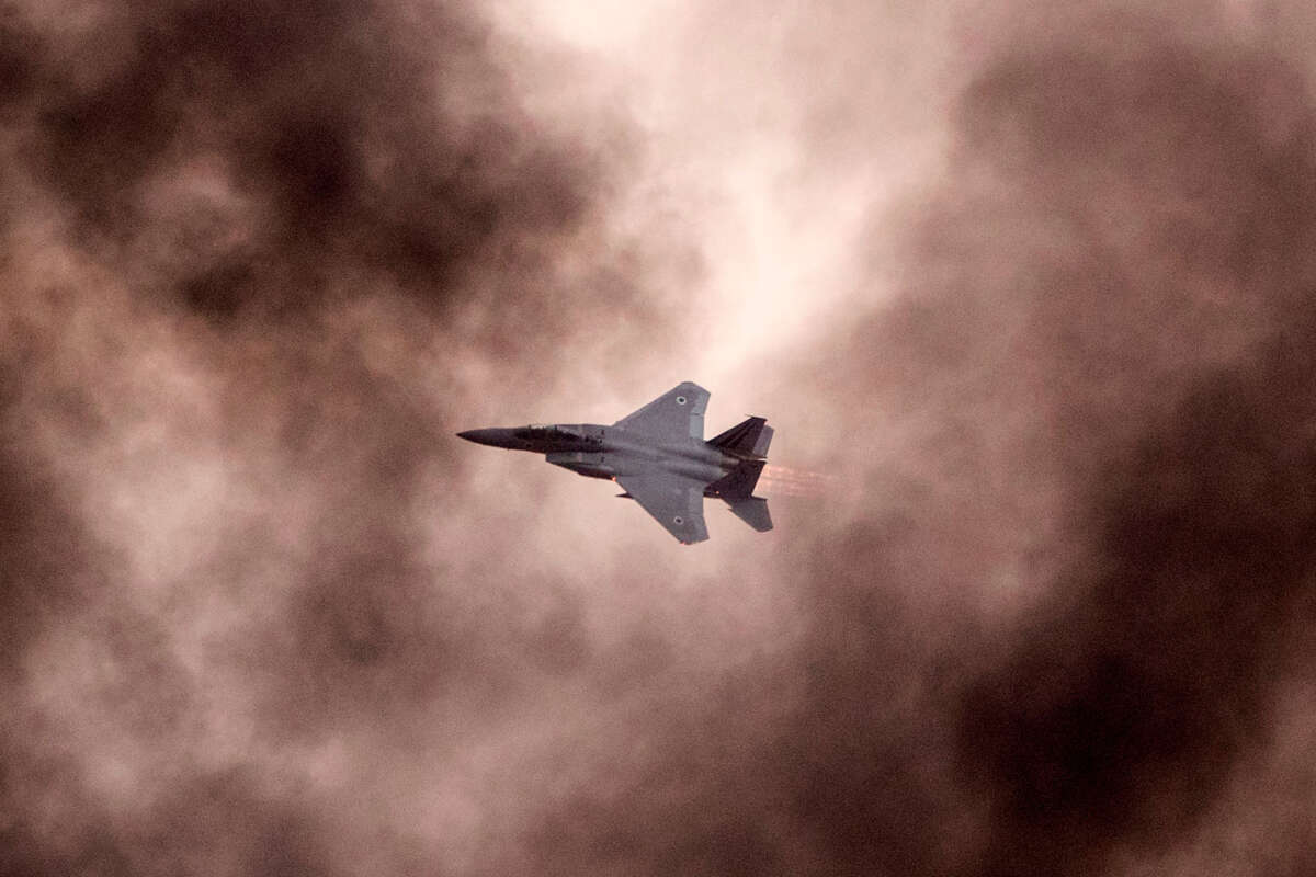 An Israeli F-15 I fighter jet performs during an air show at the graduation ceremony of Israeli air force pilots at the Hatzerim Israeli Air Force base in the Negev desert, near the southern Israeli city of Beer Sheva, on December 27, 2017.