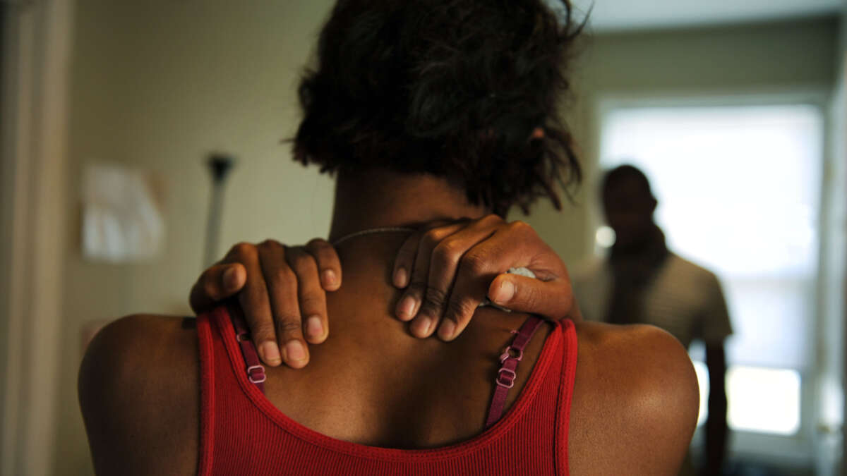 Sarah Feliciano, a transgender woman, talks with a housemate at the Wanda Alston House on May 5, 2011, in Washington, D.C. The Alston House is a transitional home specifically for houseless LGBTQ youth ages 16-24.