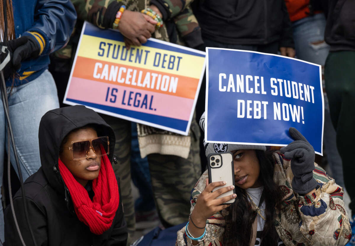 Activists and students protest in front of the Supreme Court during a rally for student debt cancellation in Washington, D.C., on February 28, 2023.