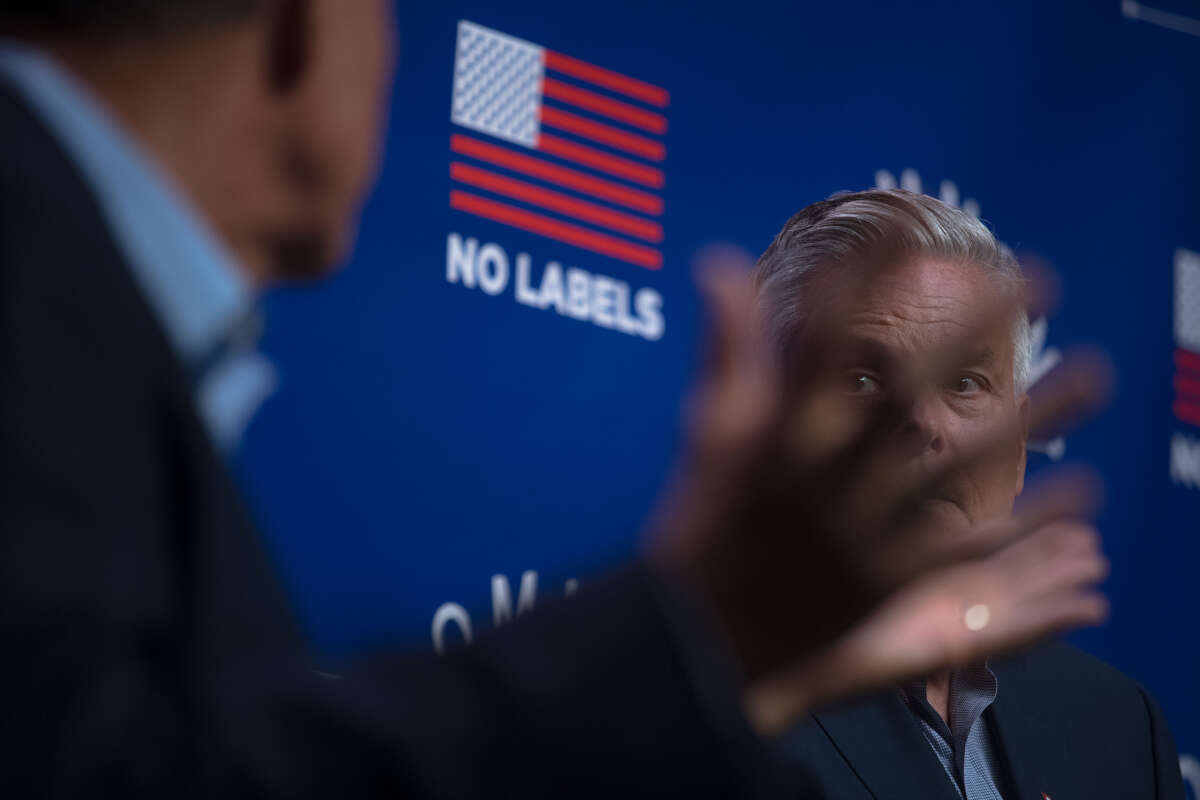 Former Utah governor Jon Huntsman (right) was co-headliner along with Sen. Joe Manchin III at the 'Common Sense' Town Hall, an event sponsored by the bipartisan group No Labels, held on July 17, 2023, at St. Anselm College in Manchester, New Hampshire.