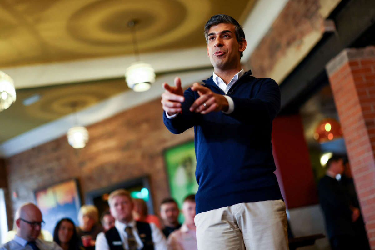British Prime Minister Rishi Sunak gestures as he attends a Q&A at The Queens Hotel, a JD Wetherspoon pub, on March 7, 2024, in Maltby, Rotherham, United Kingdom.