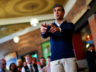 British Prime Minister Rishi Sunak gestures as he attends a Q&A at The Queens Hotel, a JD Wetherspoon pub, on March 7, 2024, in Maltby, Rotherham, United Kingdom.