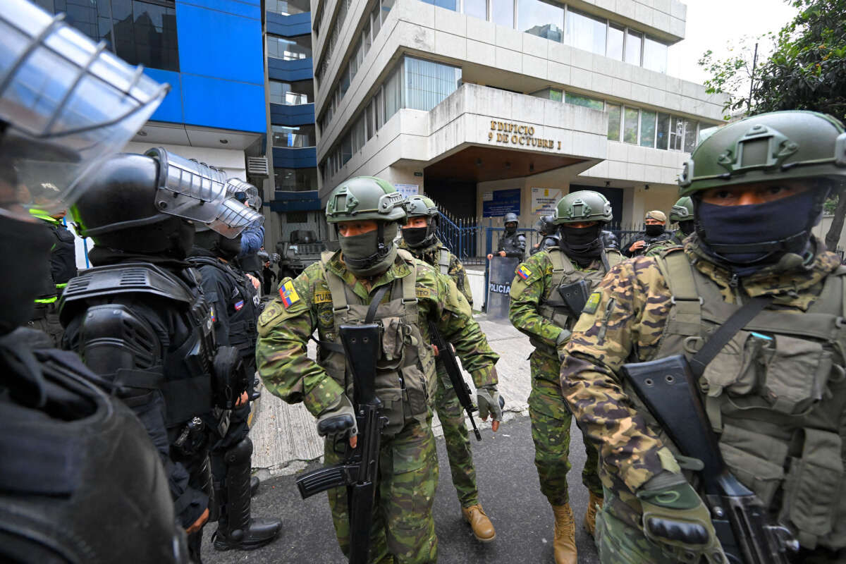 Military and police officers deploy a security operation during the exit of former Ecuadorian vice president Jorge Glas from the Flagrancy Unit of the Public Prosecutor's Office in Quito, Ecuador, on April 6, 2024.