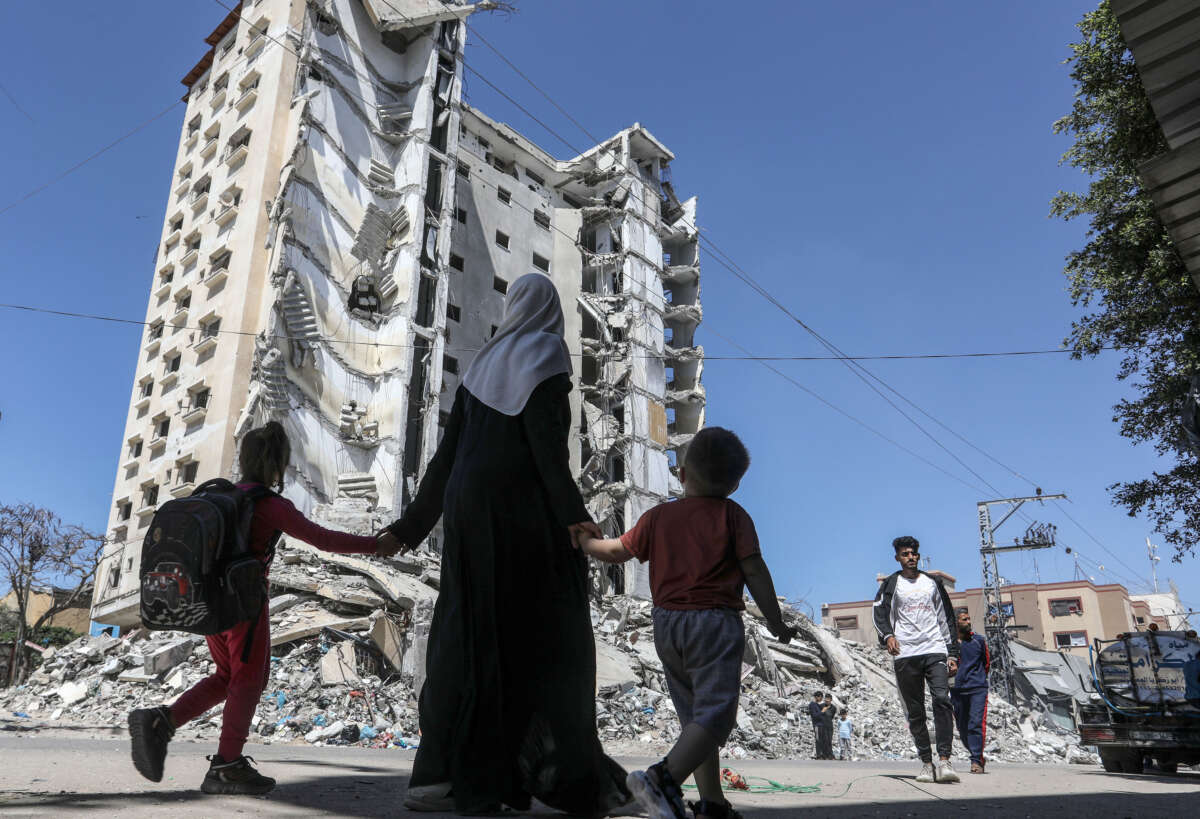 Palestinians try to go about their daily lives among the rubble and ash of the buildings in the Gaza Strip, which has been under intense Israeli bombardment for over 183 days in Rafah, Gaza, on April 6, 2024.