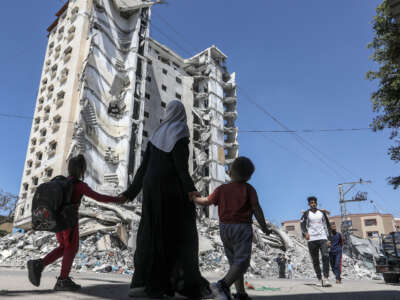 Palestinians try to go about their daily lives among the rubble and ash of the buildings in the Gaza Strip, which has been under intense Israeli bombardment for over 183 days in Rafah, Gaza, on April 6, 2024.