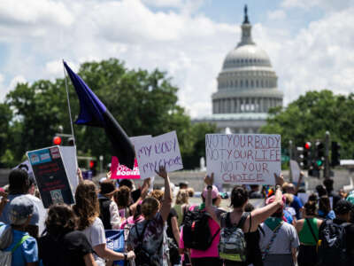 Abortion rights demonstrators rally to mark the first anniversary of the U.S. Supreme Court ruling in the Dobbs v Women's Health Organization case in Washington, D.C., on June 24, 2023.
