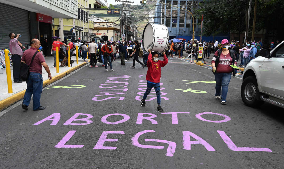 Women march in Tegucigalpa, Honduras, on January 25, 2021, to protest against Congress strengthening the constitutionally mandated ban on abortion and against murders due to male violence.