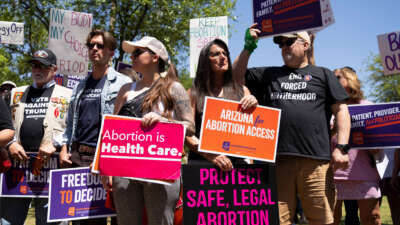 Members of Arizona for Abortion Access, the ballot initiative to enshrine abortion rights in the Arizona State Constitution, hold a press conference and protest condemning Arizona House Republicans and the 1864 abortion ban during a recess from a legislative session at the Arizona House of Representatives on April 17, 2024, in Phoenix, Arizona.