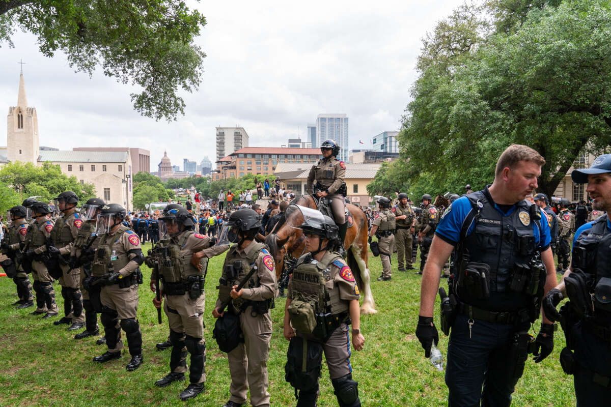 Texas State Troopers and other police forces monitor the scene as pro-Palestinian students protest on the campus of the University of Texas in Austin, Texas, on April 24, 2024.