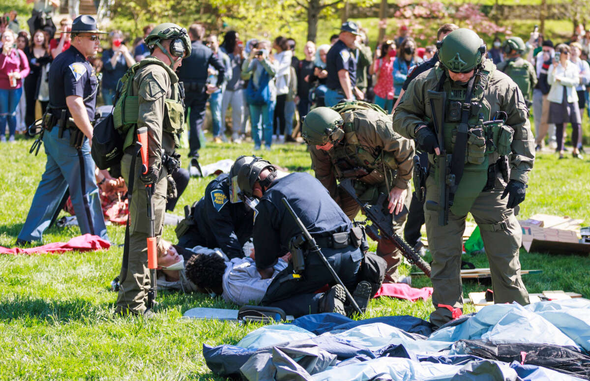 Dozens of people are arrested by the Indiana State Police riot squad during a pro-Palestinian protest on campus in Bloomington, Indiana, on April 25, 2024.