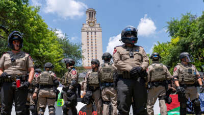 Texas State troopers stand guard during pro-Palestinian protests against Israel's continuing genocidal onslaught in Gaza, at the University of Texas in Austin, Texas, on April 29, 2024.