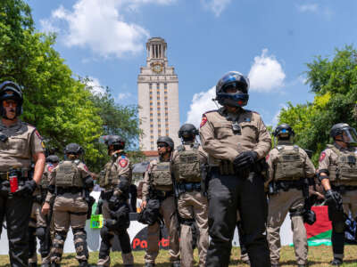 Texas State troopers stand guard during pro-Palestinian protests against Israel's continuing genocidal onslaught in Gaza, at the University of Texas in Austin, Texas, on April 29, 2024.