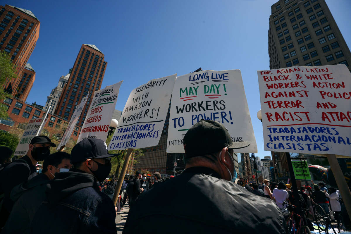 Protesters and workers gather at the Union Square Park to mark International Labor Day in New York City on May 1, 2021.