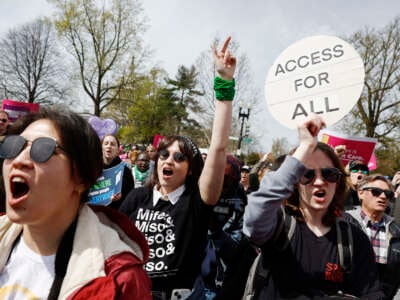 Demonstrators participate in an abortion-rights rally outside the Supreme Court as the justices of the court hear oral arguments in the case of the U.S. Food and Drug Administration v. Alliance for Hippocratic Medicine on March 26, 2024, in Washington, D.C.