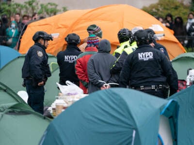 NYPD officers make arrests of pro-Palestinian demonstrators on the lawn of Columbia University on April 18, 2024, in Manhattan, New York.