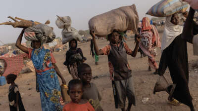 Newly arrived refugees from Darfur, in Sudan, head to their shelters on April 24, 2024, in Adre, Chad.