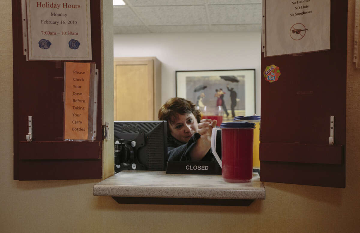 Vanessa Leavitt puts out Tang and Kool-Aid for patients to take with their Methadone treatment at CAP Quality Care clinic in Westbrook, Maine, on January 22, 2015.