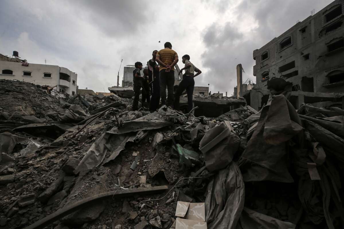 Palestinians are checking the damage in a house that was destroyed by an overnight Israeli bombardment in Nuseirat camp in the central Gaza Strip, on April 27, 2024.