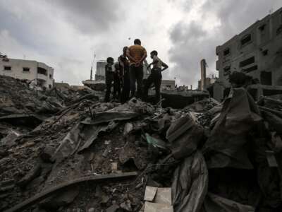 Palestinians are checking the damage in a house that was destroyed by an overnight Israeli bombardment in Nuseirat camp in the central Gaza Strip, on April 27, 2024.