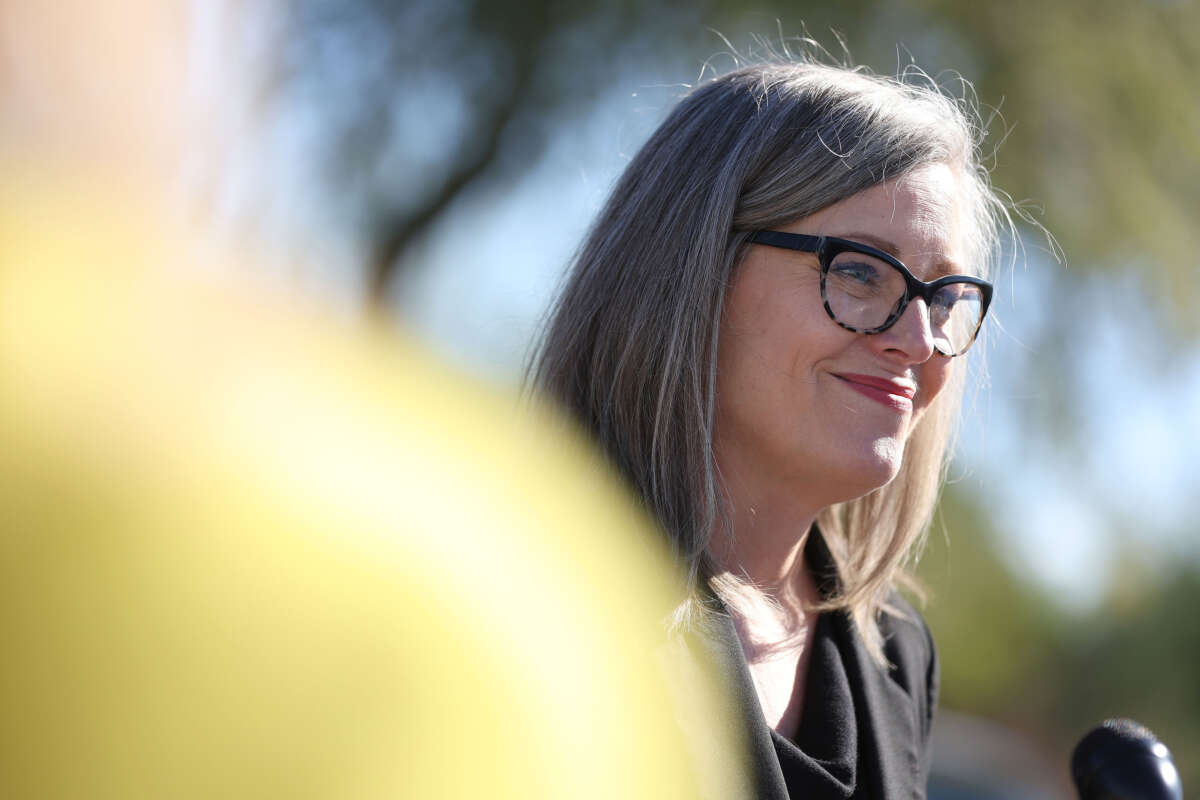 Katie Hobbs speaks to reporters during a campaign stop at Paradise Valley Community College on November 4, 2022, in Phoenix, Arizona.