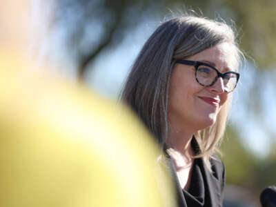 Katie Hobbs speaks to reporters during a campaign stop at Paradise Valley Community College on November 4, 2022 in Phoenix, Arizona.