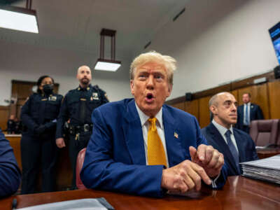 Former President Donald Trump attends his trial for allegedly covering up hush money payments at Manhattan Criminal Court on May 2, 2024, in New York City.