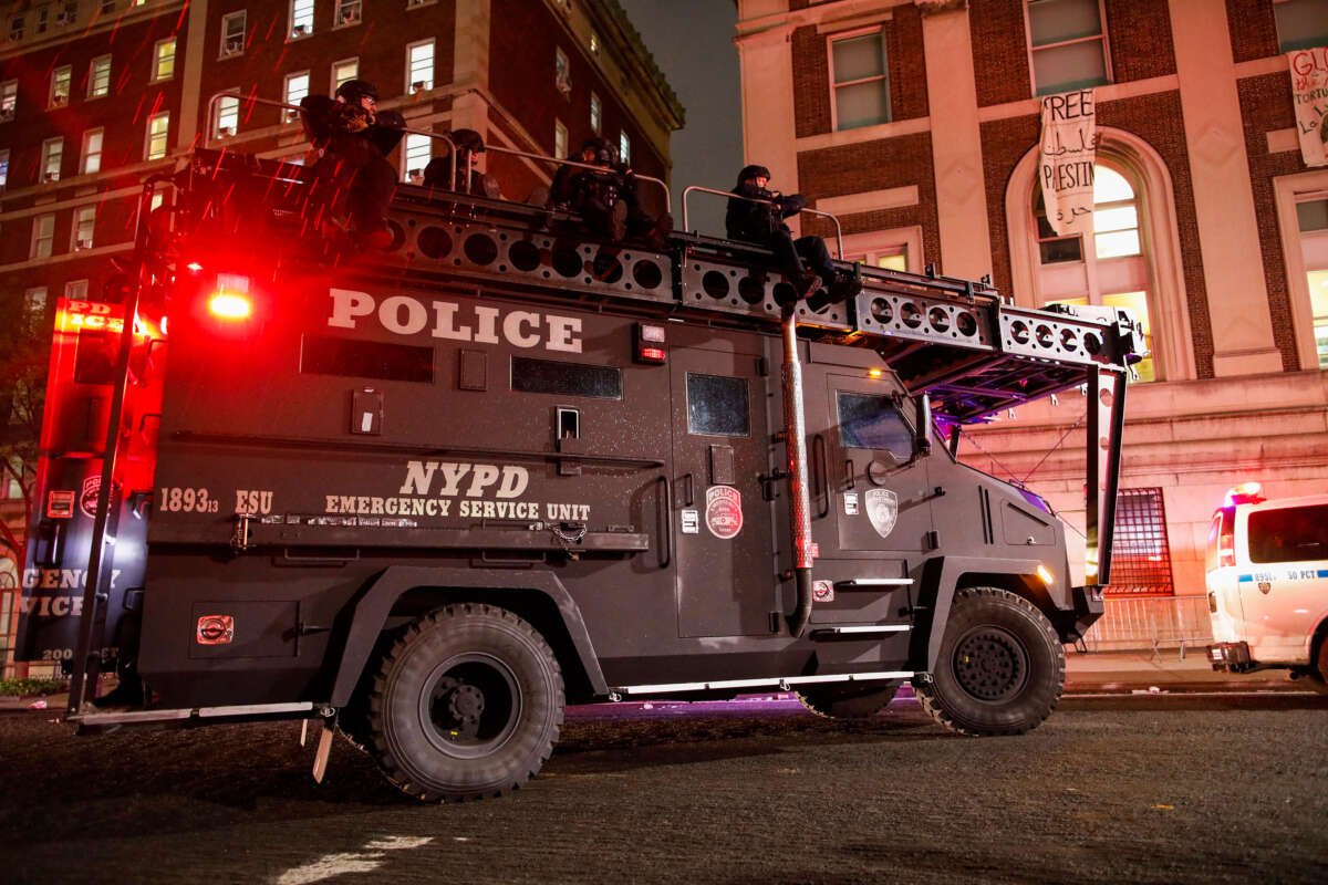 NYPD officers arrive in riot gear to evict a building that had been barricaded by pro-Palestinian student protesters at Columbia University, in New York City, on April 30, 2024.