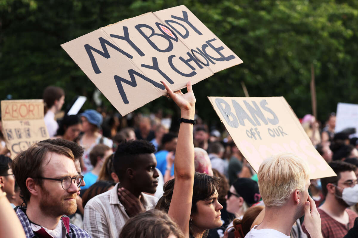 People gather to protest the Supreme Courts 6-3 decision in the Dobbs v. Jackson Women’s Health Organization at Washington Square Park on June 24, 2022, in New York City.