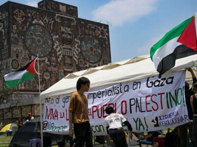 Activists from the Interuniversity and Popular Assembly in Solidarity with the People of Palestine erect a tent in front of the Rectory Tower of the National Autonomous University of Mexico as part of a camp to protest Israel's attacks on the Gaza Strip and demand from the authorities the breaking of academic, political and economic relations between Mexico and Israel, in Mexico City on May 2, 2024.