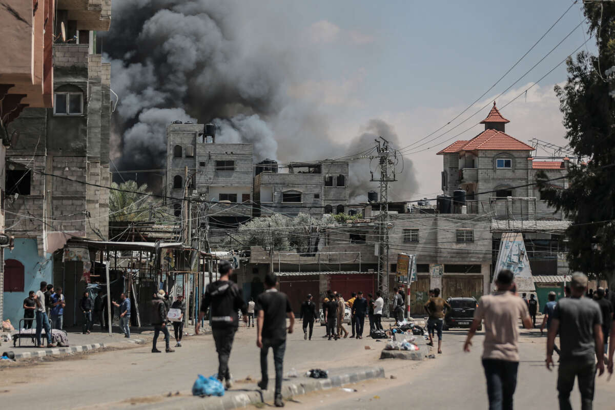 Smoke rises from shopping center following an Israeli airstrike on east of Rafah, Gaza, on May 7, 2024.