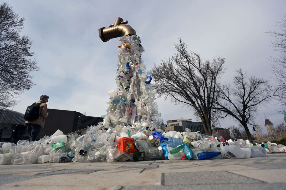 A sculpture titled Giant Plastic Tap by Canadian artist Benjamin Von Wong is displayed outside the fourth session of the UN Intergovernmental Negotiating Committee on Plastic Pollution in Ottawa, Canada, on April 23, 2024.