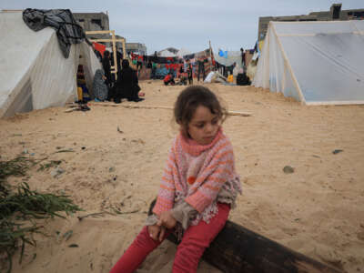 Displaced Palestinian families live in tents in the Al-Mawasi area of Rafah, situated south of the Gaza Strip and near the border with Egypt, on December 7, 2023.
