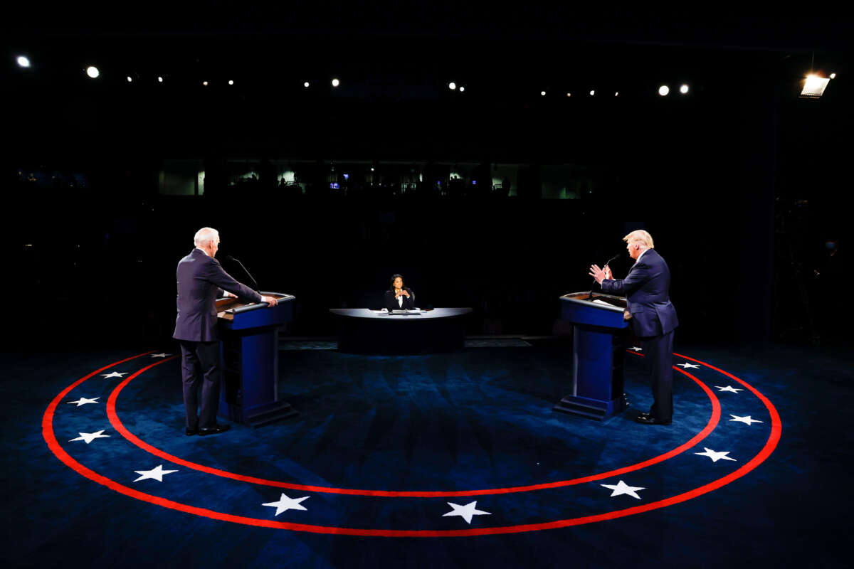 Then-President Donald Trump and Democratic presidential nominee Joe Biden participate in the final presidential debate at Belmont University on October 22, 2020, in Nashville, Tennessee.