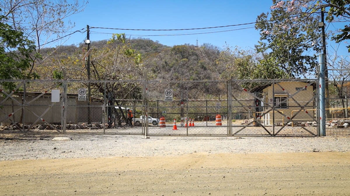 The front gate to the open pit mine Cerro Blanco.