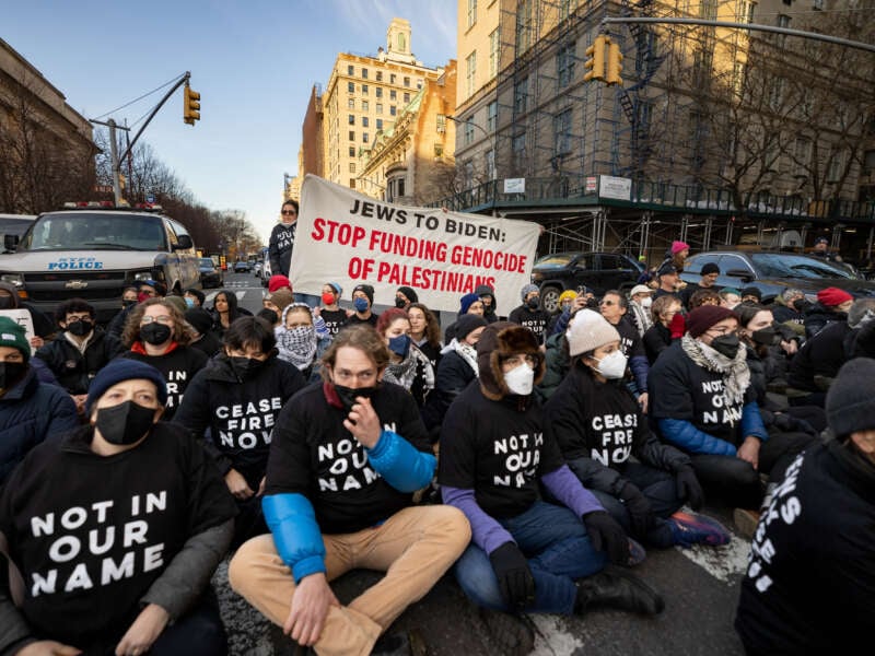 Members of Jewish Voice for Peace join activists shutting down traffic in front of the Metropolitan Museum of Art, while protesting President Joe Biden's continued support and funding for Israel's assault on Gaza, on February 7, 2024, in New York City.
