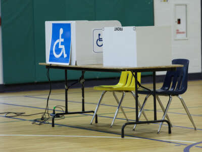 A view from the voting area as voters cast their ballots at a polling location at the Oakridge Elementary school in Arlington, Virginia, on March 5, 2024.