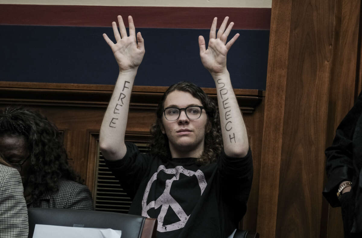 A demonstrator attends a hearing called "Calling for Accountability: Stopping Antisemitic College Chaos" before the House Committee on Education and the Workforce on May 23, 2024 in Washington, D.C. 