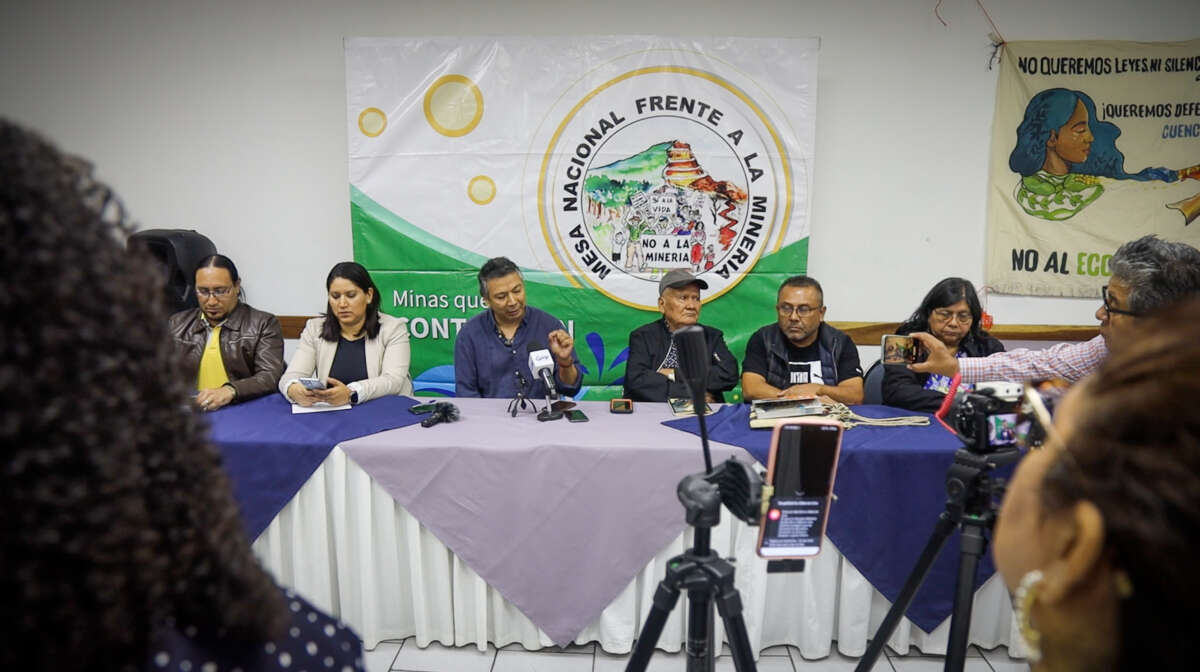 Anti-mining activist Pedro Cabezas speaks into the mic at a press conference denouncing the Cerro Blanco Mine in San Salvador.