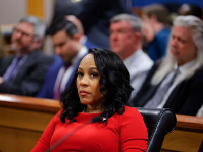 Fulton County District Attorney Fani Willis looks on during a hearing in the case of the State of Georgia v. Donald John Trump at the Fulton County Courthouse on March 1, 2024, in Atlanta, Georgia.