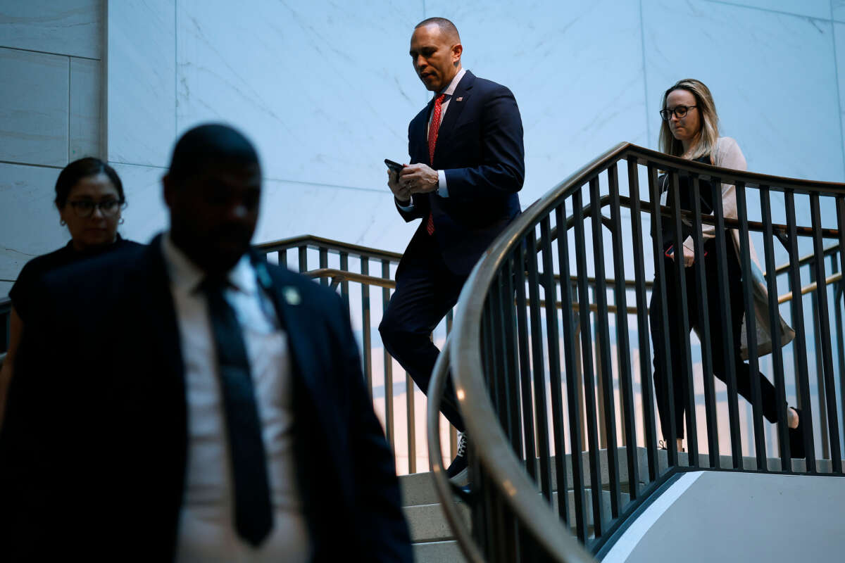 House Minority Leader Hakeem Jeffries heads to a sensitive compartmented information facility in the basement of the U.S. Capitol Visitors Center to meet with other Congressional leaders and intelligence officials from the White House on February 14, 2024, in Washington, D.C.
