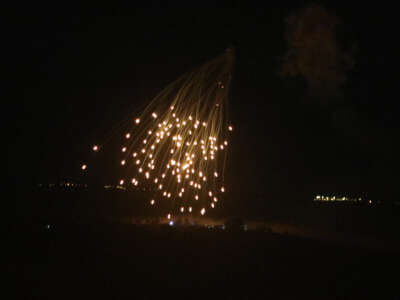 An Israeli strike illuminates the sky above the southern Lebanese village of Khiam late on April 17, 2024, amid ongoing cross-border tensions as fighting continues between Israel and Hamas militants in the Gaza Strip.