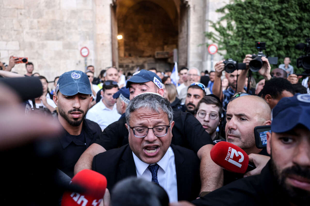 Israel's National Security Minister Itamar Ben-Gvir speaks to the press as he joins Jewish nationalists, including far-right activists, rallying at Jerusalem's Damascus Gate on June 5, 2024, during the so-called Jerusalem Day flag march.