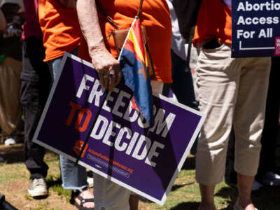 Members of Arizona for Abortion Access, the ballot initiative to enshrine abortion rights in the Arizona State Constitution, hold a press conference and protest condemning Arizona House Republicans and the 1864 abortion ban during a recess from a legislative session at the Arizona House of Representatives on April 17, 2024, in Phoenix, Arizona.