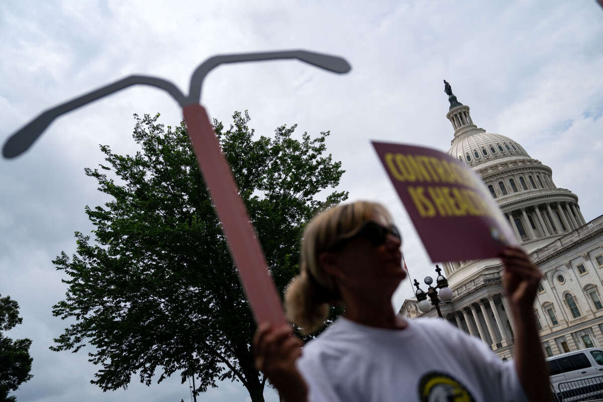 Medical workers and reproductive care patients listen during a news conference outside of the U.S. Capitol Building on June 12, 2024, in Washington, D.C.